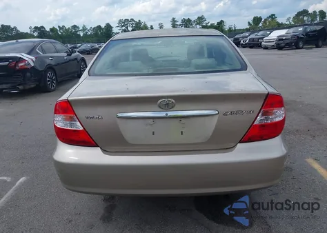 2004 Toyota Camry Le z USA, uszkodzony, nr VIN 4T1BE32K74U827529
